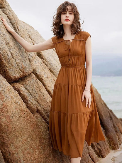 Vestido Longo com Decote V, Laço e Saia em Camadas