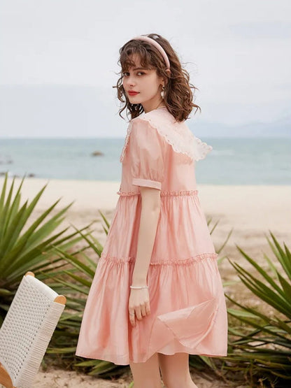 Vestido Curto com Abotoamento e Gola Peter Pan