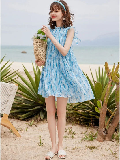 Mini vestido com corte A, padrão tie-dye e babados