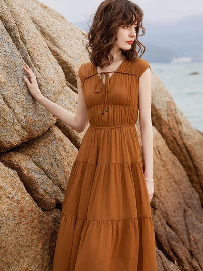 Vestido Longo com Decote V, Laço e Saia em Camadas